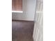 Bedroom with carpet flooring, a window, and a white paneled door at 6541 Chinatown St, Las Vegas, NV 89166