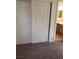 Bedroom with carpet flooring and a sliding closet door at 6541 Chinatown St, Las Vegas, NV 89166
