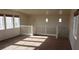 Inviting living room area with natural light and neutral carpeting at 6541 Chinatown St, Las Vegas, NV 89166