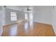Bright living room featuring wood floors, white walls, and ample natural light at 6552 Coldwater Bay Dr, Las Vegas, NV 89122