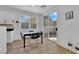 Bright dining area with modern table set and sliding door to backyard at 6817 Frances Celia Ave, Las Vegas, NV 89122