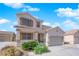 Charming two-story home featuring a spacious driveway and well-maintained front yard landscaping at 6817 Frances Celia Ave, Las Vegas, NV 89122
