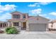 Charming two-story home featuring a spacious driveway and well-maintained front yard landscaping at 6817 Frances Celia Ave, Las Vegas, NV 89122