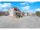 Spacious two-story home with a large driveway, featuring a well-manicured front yard at 6817 Frances Celia Ave, Las Vegas, NV 89122