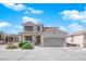 Charming two-story home featuring a spacious driveway and well-maintained front yard landscaping at 6817 Frances Celia Ave, Las Vegas, NV 89122