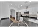 Modern kitchen featuring stainless steel appliances and white cabinets at 6817 Frances Celia Ave, Las Vegas, NV 89122