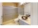 Bathroom featuring glass enclosed shower, vessel sink, marble floors, and granite countertops at 6944 Emerald Springs Ln, Las Vegas, NV 89113