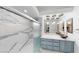 Modern bathroom with a marble shower, bowl sink, and updated fixtures at 6944 Emerald Springs Ln, Las Vegas, NV 89113