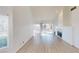 Bright and airy living room with fireplace and sliding glass doors leading to the patio at 6944 Emerald Springs Ln, Las Vegas, NV 89113