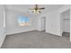 Bedroom with neutral walls, carpet floors, closet, window and ceiling fan at 7213 Buglehorn St, Las Vegas, NV 89131