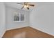 Simple bedroom features a ceiling fan and a window with lots of sunlight at 7213 Buglehorn St, Las Vegas, NV 89131