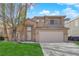 Charming two-story home with a well-maintained lawn and desert landscaping in a residential neighborhood at 7213 Buglehorn St, Las Vegas, NV 89131