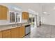 Kitchen leading into the living room with stainless steel appliances at 7213 Buglehorn St, Las Vegas, NV 89131
