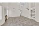 Bright living room featuring vaulted ceilings, a fireplace, and staircase at 7213 Buglehorn St, Las Vegas, NV 89131