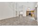 Spacious living room featuring stairs, tile flooring, and open concept design at 7213 Buglehorn St, Las Vegas, NV 89131