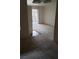 Spacious, carpeted living room with a view of the front doorway at 8101 W Flamingo Rd # 1073, Las Vegas, NV 89147
