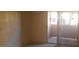 Neutral room featuring sliding doors for accessing the patio or balcony at 8101 W Flamingo Rd # 1073, Las Vegas, NV 89147