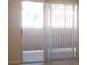 Bright room featuring sliding doors for accessing the patio or balcony at 8101 W Flamingo Rd # 1073, Las Vegas, NV 89147