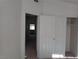 Spacious bedroom with a closet and an open doorway offers versatility and comfort at 8332 Shore Breeze Dr, Las Vegas, NV 89128