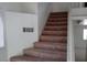 Staircase with carpet steps and white wall with a floor vent at 8332 Shore Breeze Dr, Las Vegas, NV 89128