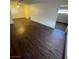 Bright living room with wood flooring and a ceiling fan at 834 Benita Pl, Boulder City, NV 89005
