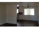 A room featuring wood floors, a ceiling fan, and natural light at 834 Benita Pl, Boulder City, NV 89005