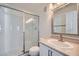 Clean bathroom with a shower, toilet, and vanity at 8425 Sewards Bluff Ave, Las Vegas, NV 89129