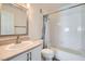 Clean bathroom with a shower-tub combination and vanity with a sink and storage at 8425 Sewards Bluff Ave, Las Vegas, NV 89129