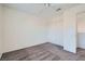 Simple bedroom featuring soft carpeting and a closet for essential storage space at 8425 Sewards Bluff Ave, Las Vegas, NV 89129