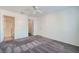 Large main bedroom with neutral carpet, ensuite, and walk-in closet at 8425 Sewards Bluff Ave, Las Vegas, NV 89129