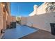 Private patio featuring textured walls and easy access via the gated doorway at 8425 Sewards Bluff Ave, Las Vegas, NV 89129