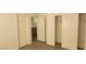 Bedroom featuring a view into a bathroom and closet with sliding doors at 8695 Canfield Canyon Ave, Las Vegas, NV 89178