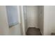 Hallway featuring wood-look flooring and a window at 8695 Canfield Canyon Ave, Las Vegas, NV 89178