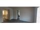 Living room with bright light, open space and wood-look flooring at 8695 Canfield Canyon Ave, Las Vegas, NV 89178