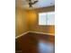 Bedroom features wood flooring, ceiling fan, and blinds at 9014 Sierra Palms Way, Henderson, NV 89074