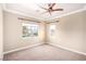 Cozy bedroom with natural light and a ceiling fan at 916 Granger Farm Way, Las Vegas, NV 89145