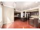 Gourmet kitchen featuring an island, stainless steel appliances and beautiful wood flooring at 916 Granger Farm Way, Las Vegas, NV 89145