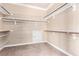 Spacious walk-in closet features shelving on the walls and carpeted floor at 916 Granger Farm Way, Las Vegas, NV 89145