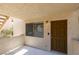 Cozy entryway features a window for natural light and a secure front door at 924 Falconhead Ln # 102, Las Vegas, NV 89128