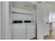 Functional laundry closet with a washer and dryer inside the unit at 924 Falconhead Ln # 102, Las Vegas, NV 89128