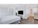 Bright bedroom boasts modern design, stylish floors, closet space and television at 945 Vegas Valley Dr, Las Vegas, NV 89109