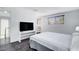 Clean, bright bedroom with modern decor, stylish floors, and ample natural light at 945 Vegas Valley Dr, Las Vegas, NV 89109