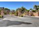 View of the stately, secured gated entrance to the Las Vegas Country Club Estates neighborhood at 945 Vegas Valley Dr, Las Vegas, NV 89109