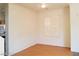 Bright dining room features wood floors and shuttered window at 9937 La Paca Ave, Las Vegas, NV 89117