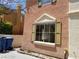 Exterior shot of a window with a frame and shutters at 9937 La Paca Ave, Las Vegas, NV 89117