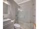 Bright bathroom featuring a glass shower and a white vanity at 10621 Tinta Ln, Las Vegas, NV 89144