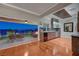 Modern kitchenette featuring sleek cabinetry, stainless steel appliances, and a seamless transition to the outdoor patio at 10621 Tinta Ln, Las Vegas, NV 89144