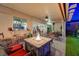 Beautiful covered patio with a fire pit and seating area at 10621 Tinta Ln, Las Vegas, NV 89144