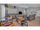 Spacious living room with arcade games and a large entertainment area at 1104 Christopher View Ave, North Las Vegas, NV 89032