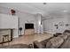Spacious living room featuring wood flooring, recessed lighting, and neutral walls at 1104 Christopher View Ave, North Las Vegas, NV 89032